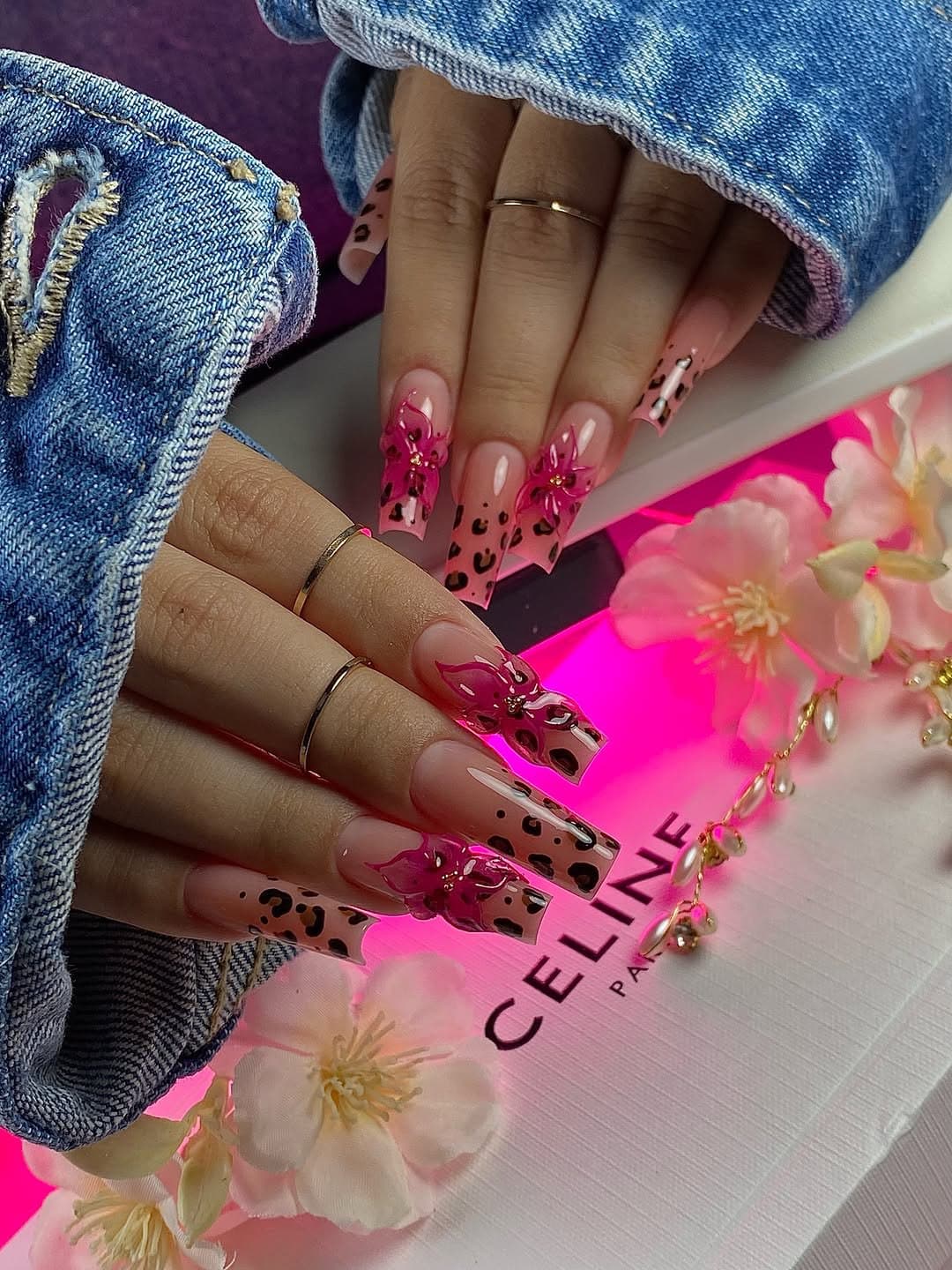 Long coffin nails with raised flowers and leopard print