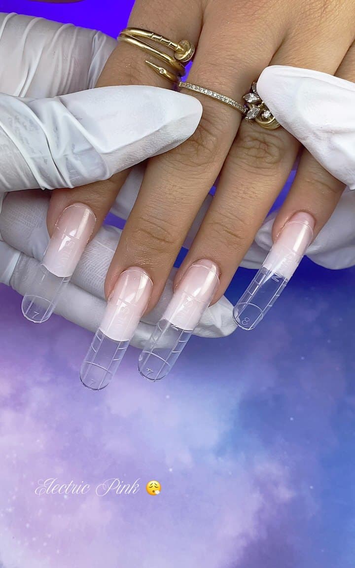Four fingers with extension forms in place before filling